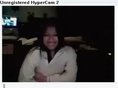 On MSN, a gorgeous Asian playgirl is smokin' and showing off her privates.